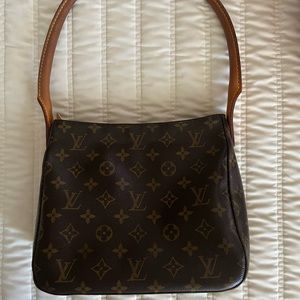 Authentic, discontinued Louis Vuitton Looping MM shoulder bag.